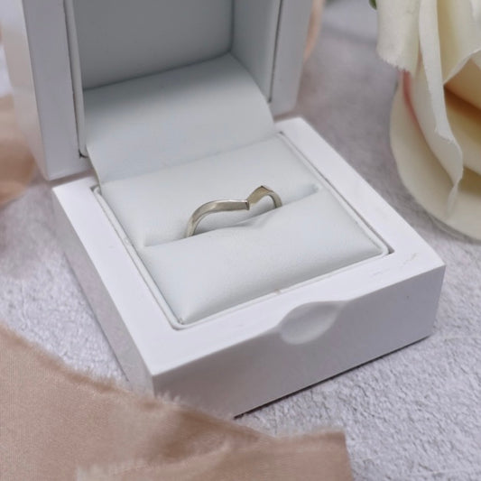 A beautiful sterling silver Moon and Dusk wishbone shaped ring in a while box, brushed delicately with a piece of pink silk ribbon